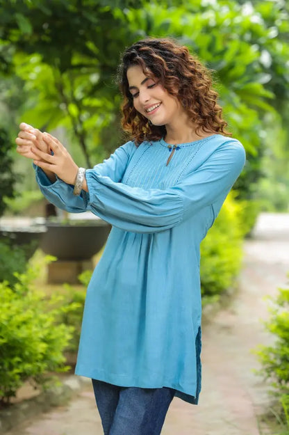 Women Blue Solid Embroidered A-Line Kurti