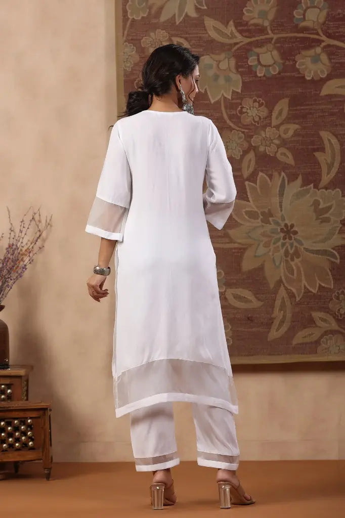 Women White Yoke Design Thread Work Straight Kurta With Trousers