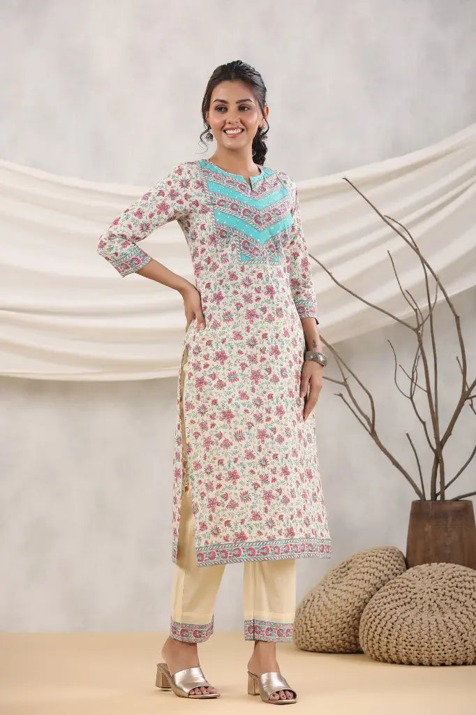 Women Cream and Pink Printed Sequinned Cotton Kurta with Trousers