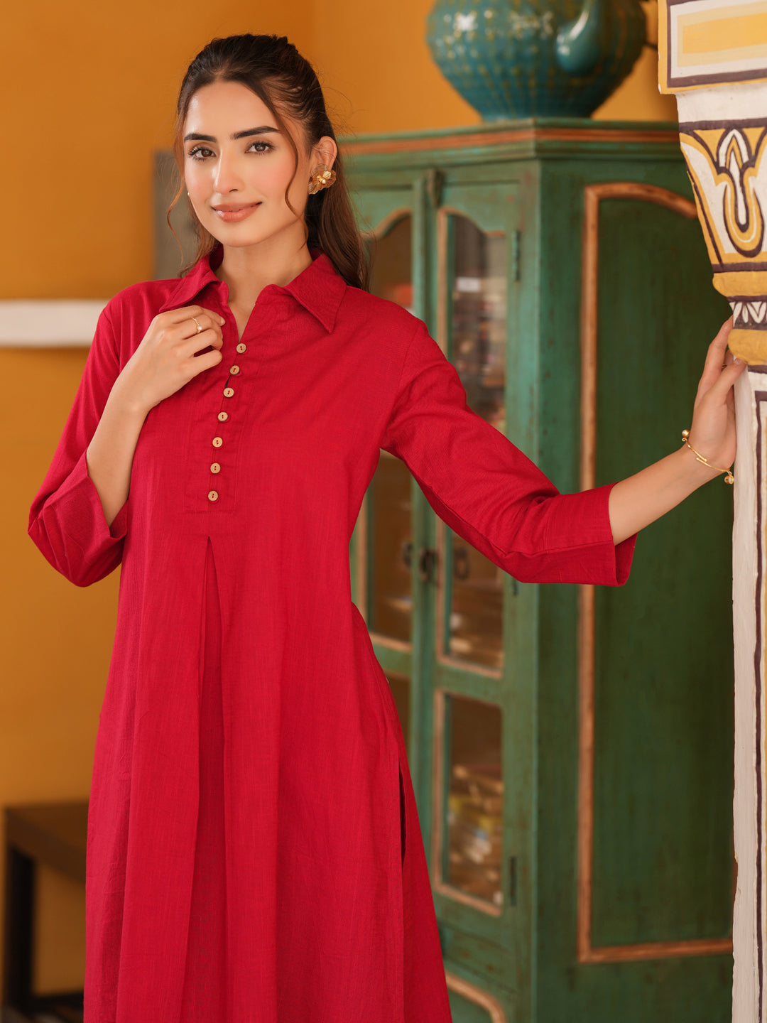 Women Solid Cotton Kurta with Trousers